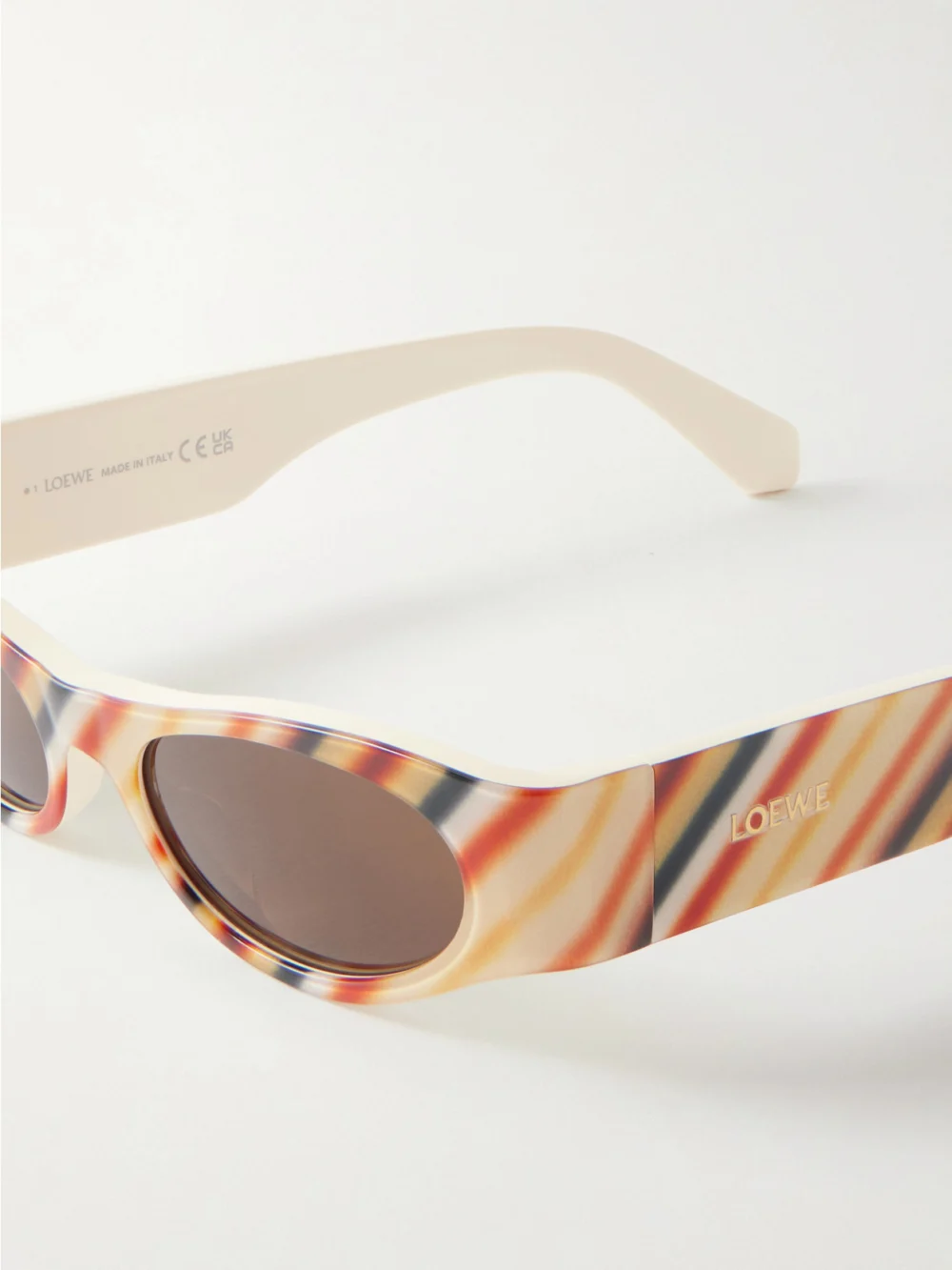 Close-up detail of the Loewe + Paula's Ibiza D-frame Striped Acetate Sunglasses