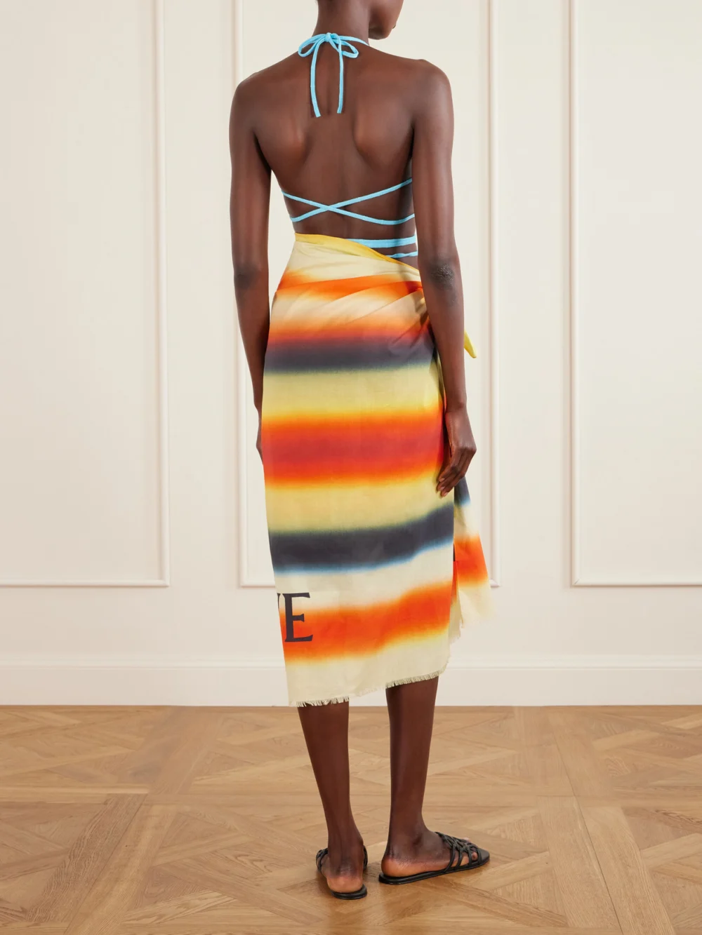 Back view of the Loewe + Paula's Ibiza Fringed Striped Cotton-voile Scarf