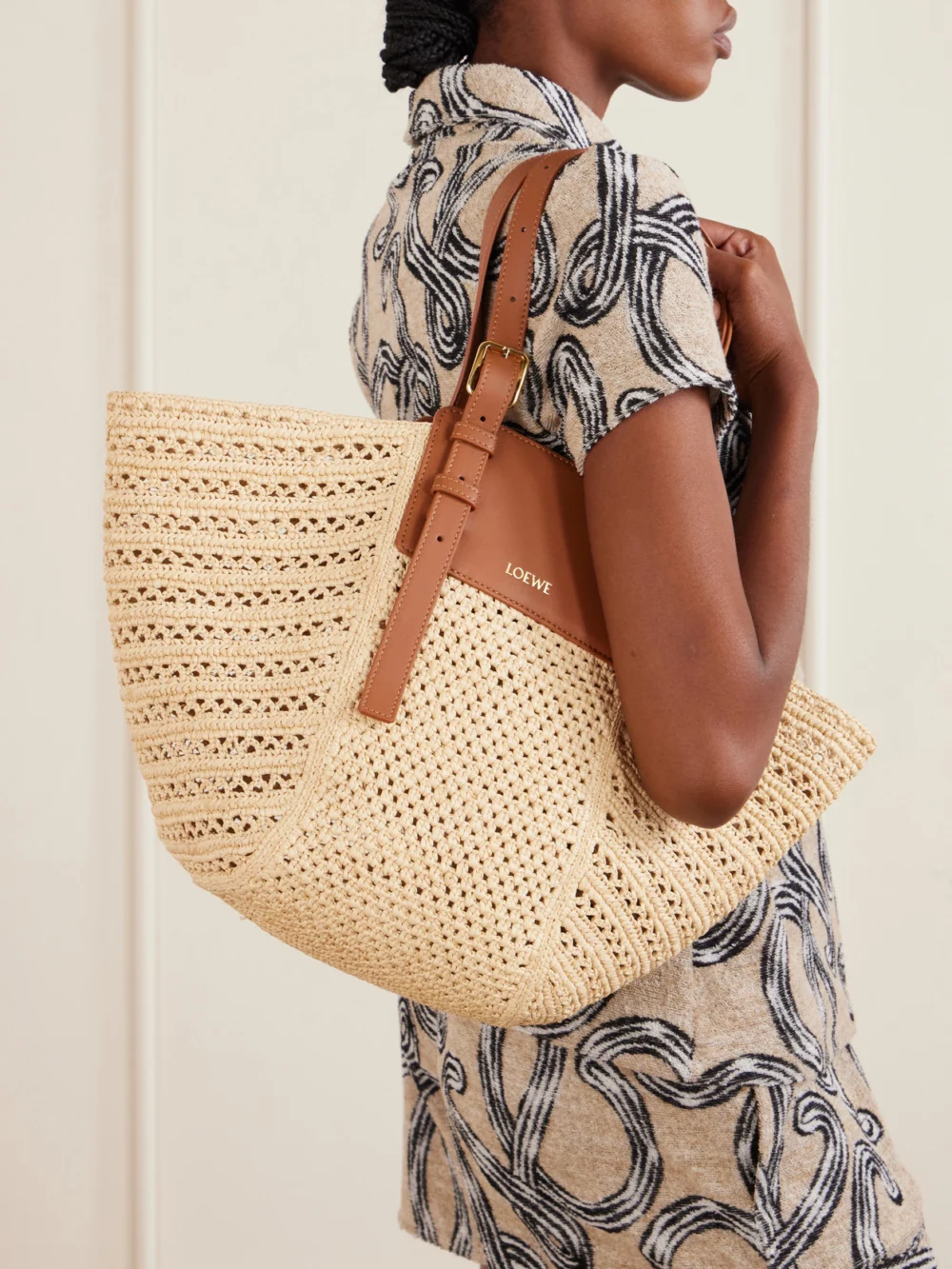 Loewe + Paula's Ibiza Hammock Cabas Leather-trimmed Raffia Tote, styled view