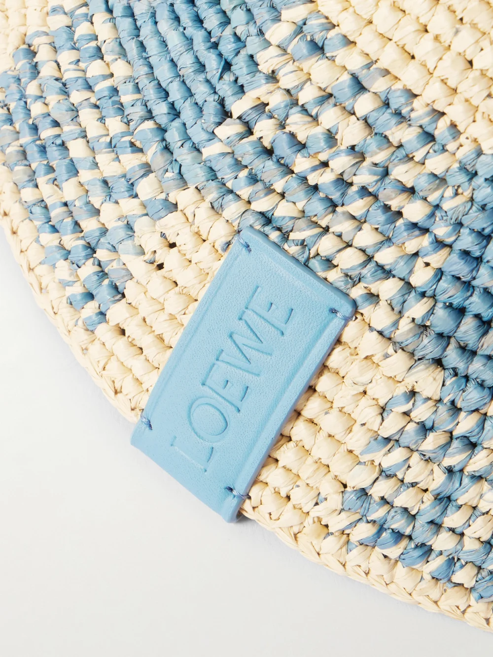 Back view of the Loewe + Paula's Ibiza Leather-trimmed Checked Raffia Bucket Hat
