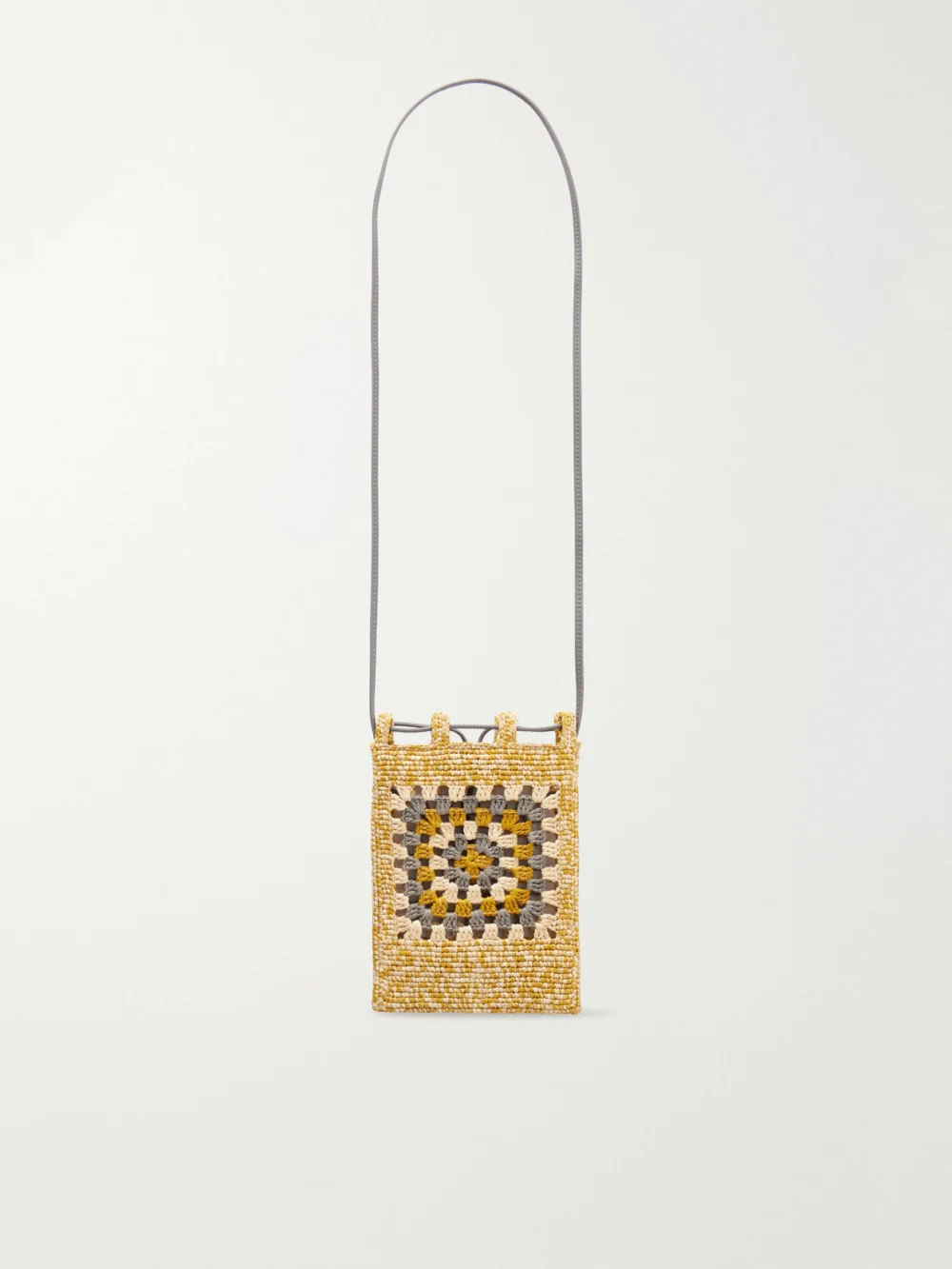 Back view of the Loewe + Paula's Ibiza Leather-trimmed Crocheted Raffia Bucket Bag