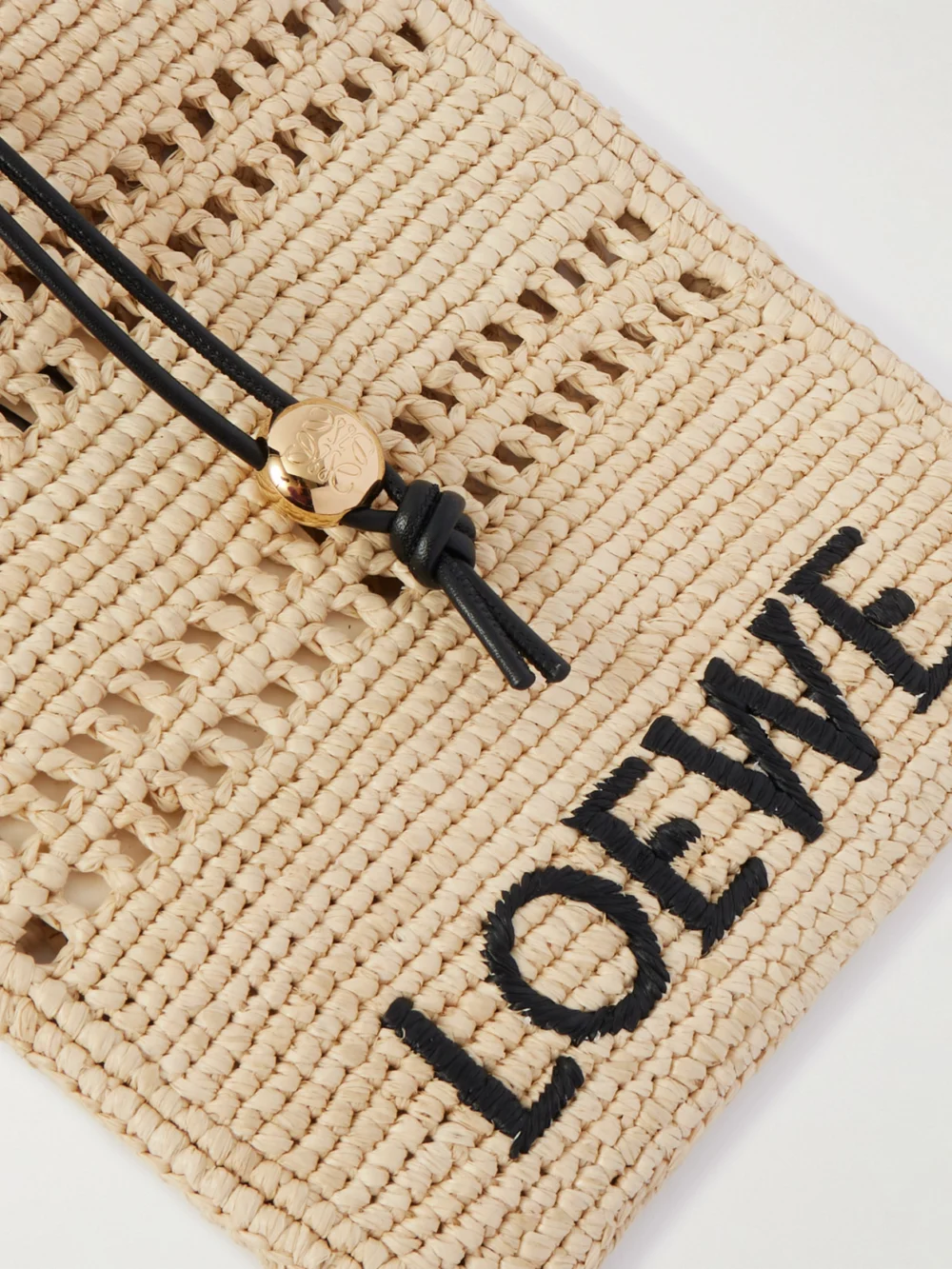 Close-up detail of the Loewe + Paula's Ibiza Leather-trimmed Embroidered Raffia Shoulder Bag
