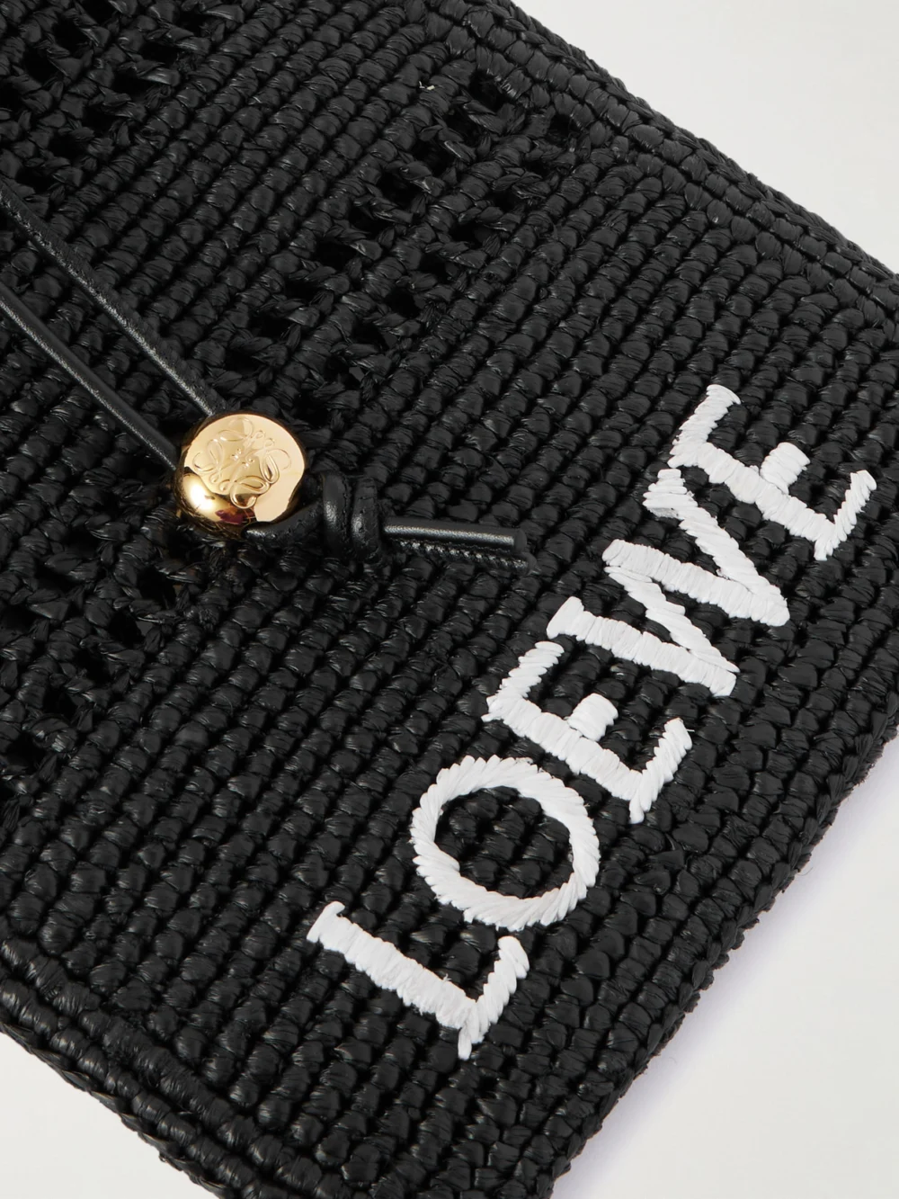 Close-up detail of the Loewe + Paula's Ibiza Leather-trimmed Embroidered Raffia Shoulder Bag