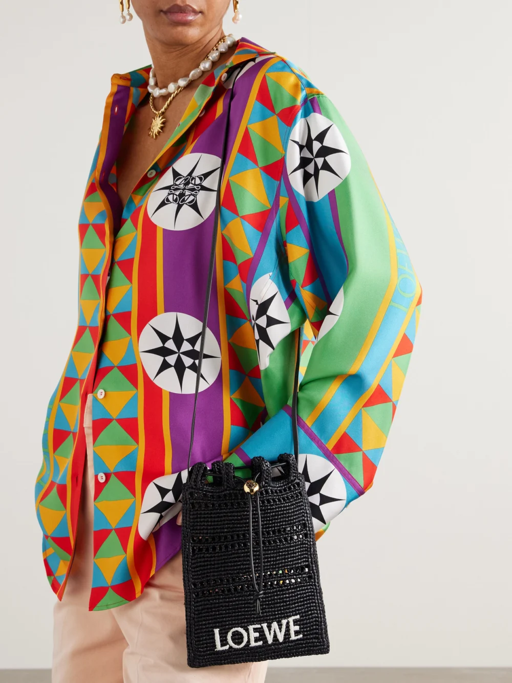 Loewe + Paula's Ibiza Leather-trimmed Embroidered Raffia Shoulder Bag, styled view
