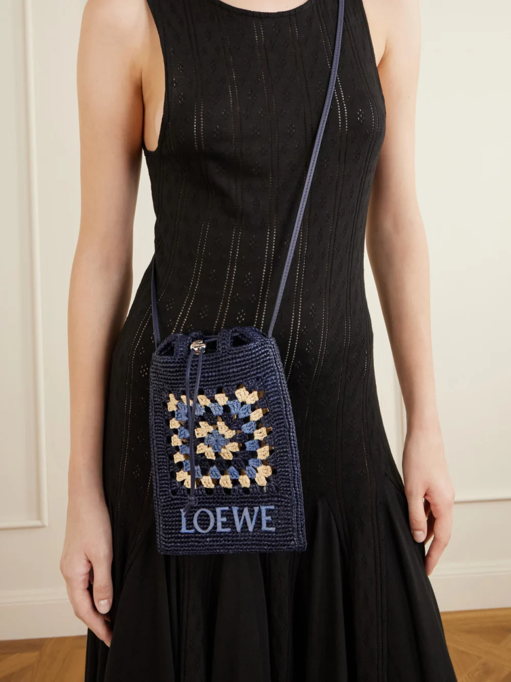 Loewe + Paula's Ibiza Logo-embroidered Leather-trimmed Crocheted Raffia Bucket Bag, styled view