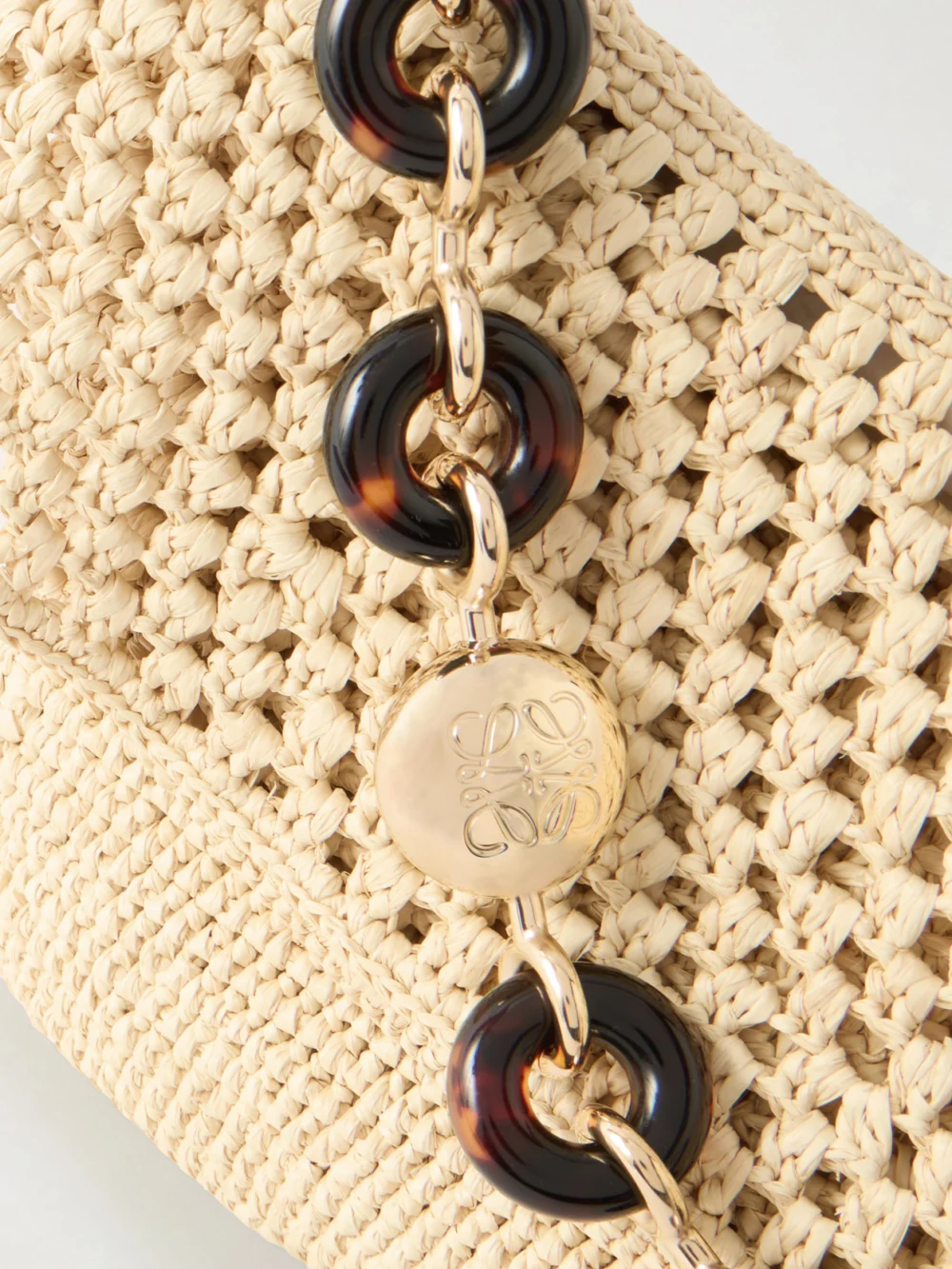 Close-up detail of the Loewe + Paula's Ibiza Ola Medium Embellished Raffia Shoulder Bag