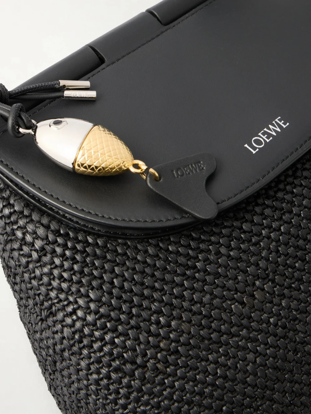 Close-up detail of the Loewe + Paula's Ibiza Pescador Medium Embellished Leather-trimmed Raffia Shoulder Bag