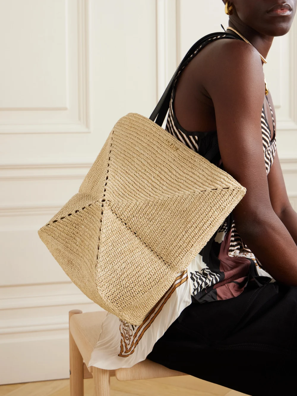 Loewe + Paula's Ibiza Puzzle Fold Medium Leather-trimmed Raffia Tote, styled view