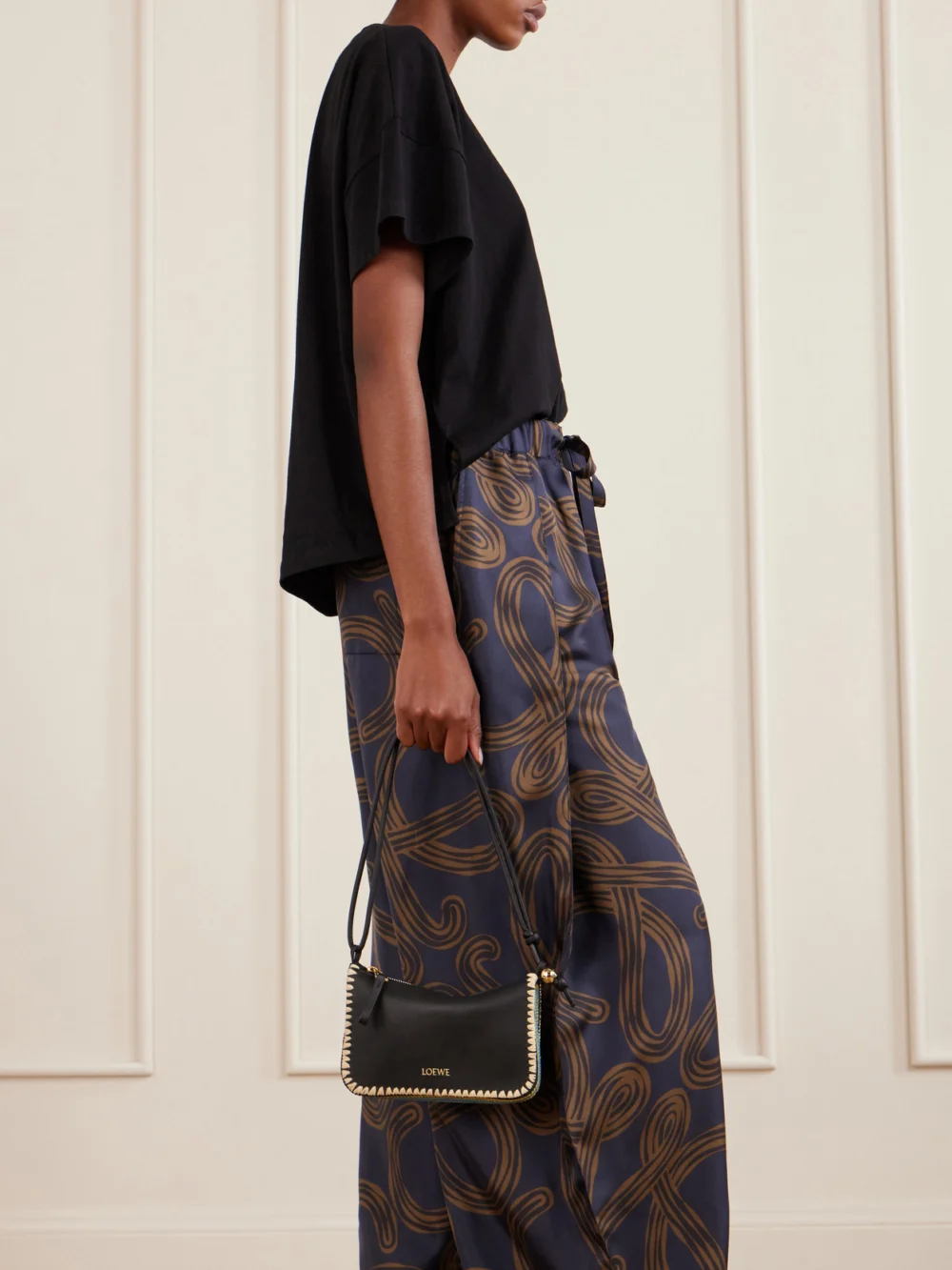 Loewe + Paula's Ibiza Rio Raffia-trimmed Leather Shoulder Bag, styled view