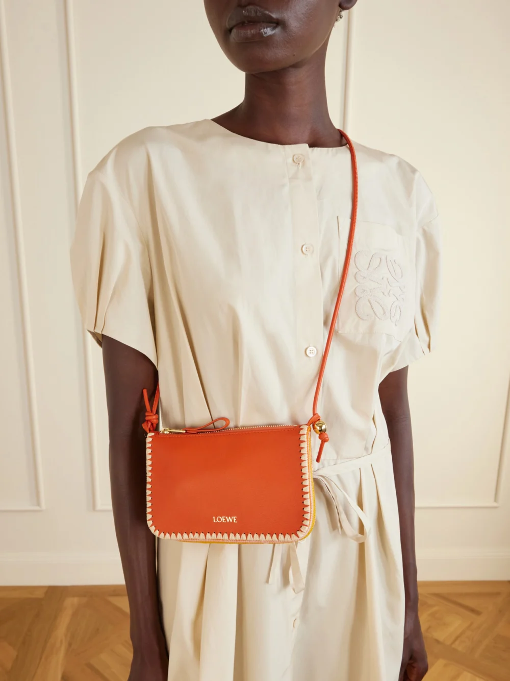 Loewe + Paula's Ibiza Rio Raffia-trimmed Leather Shoulder Bag, styled view
