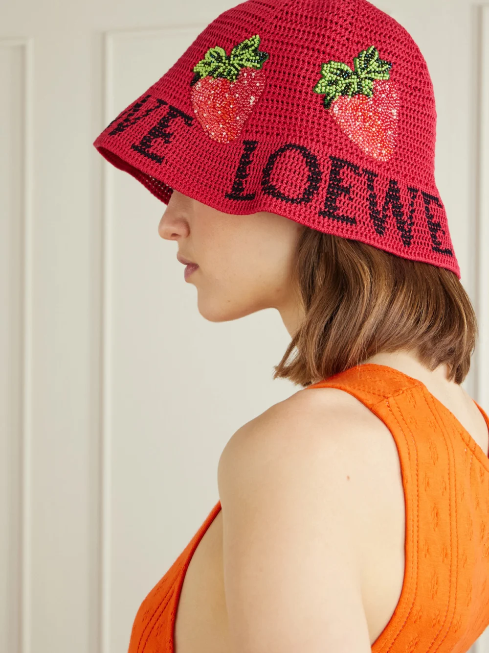 Close-up detail of the Loewe + Paula's Ibiza Strawberry Embellished Cotton Bucket Hat