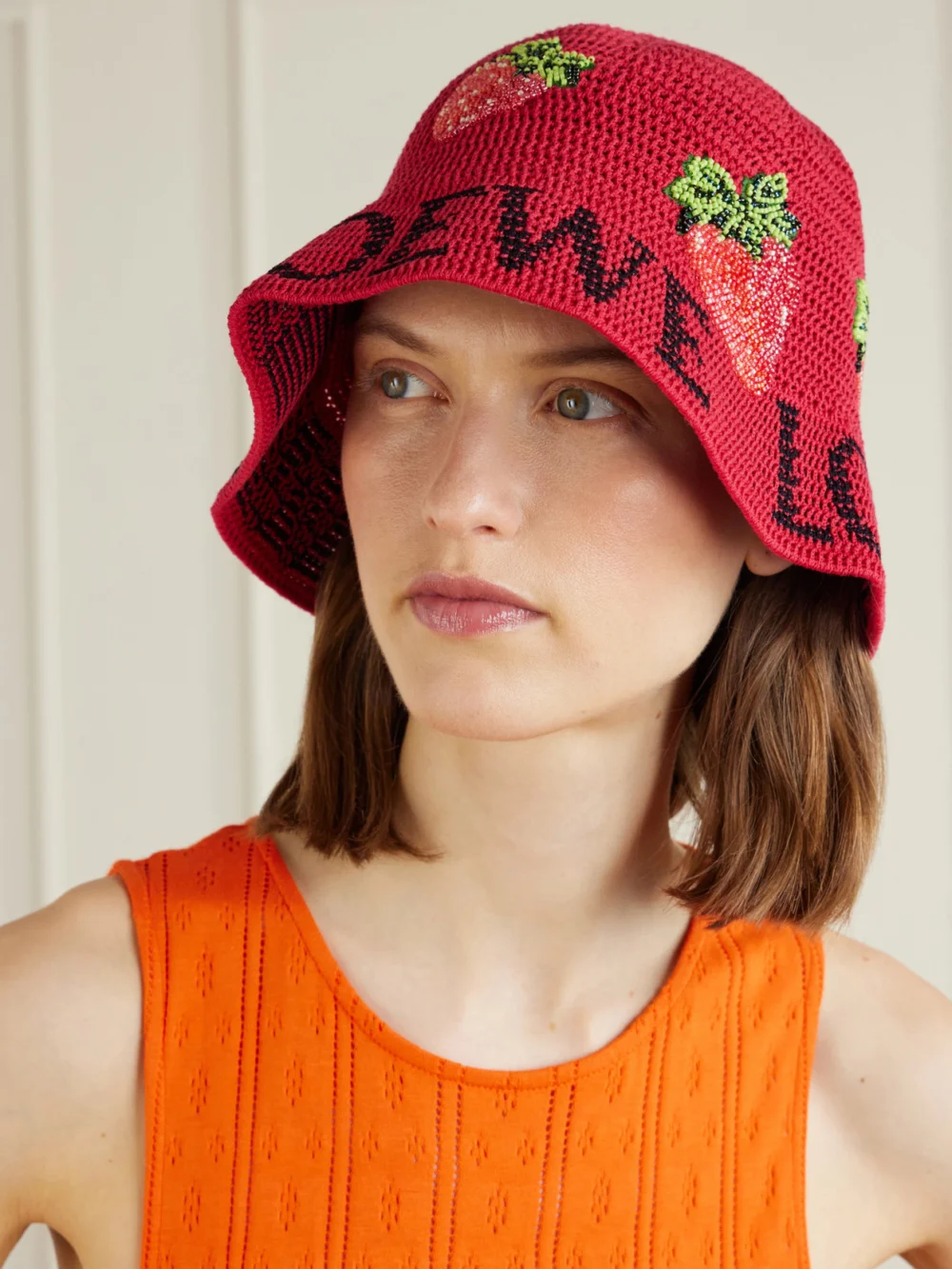 Loewe + Paula's Ibiza Strawberry Embellished Cotton Bucket Hat, styled view