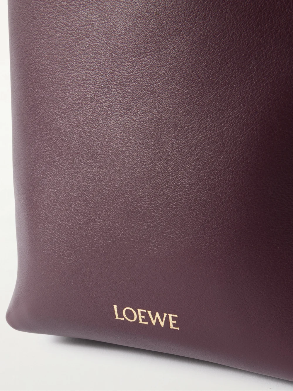 Close-up detail of the Loewe Pebble Embellished Leather Shoulder Bag
