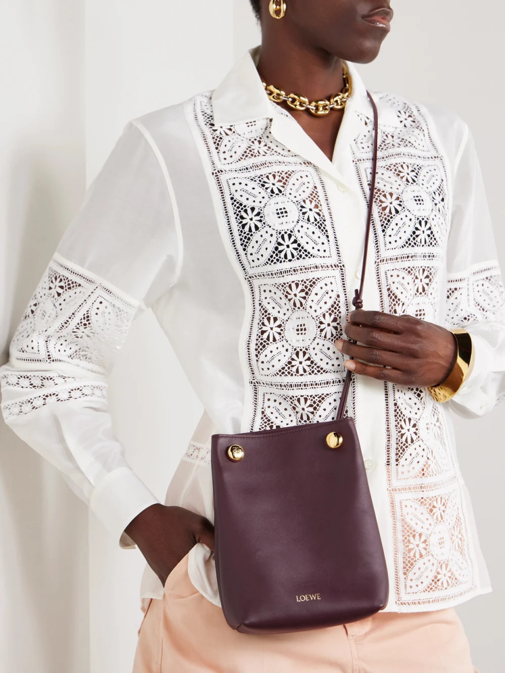 Loewe Pebble Embellished Leather Shoulder Bag, styled view