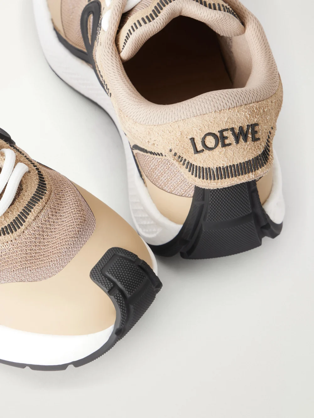 Close-up detail of the Loewe Pogo Logo-detailed Suede-trimmed Knitted Sneakers