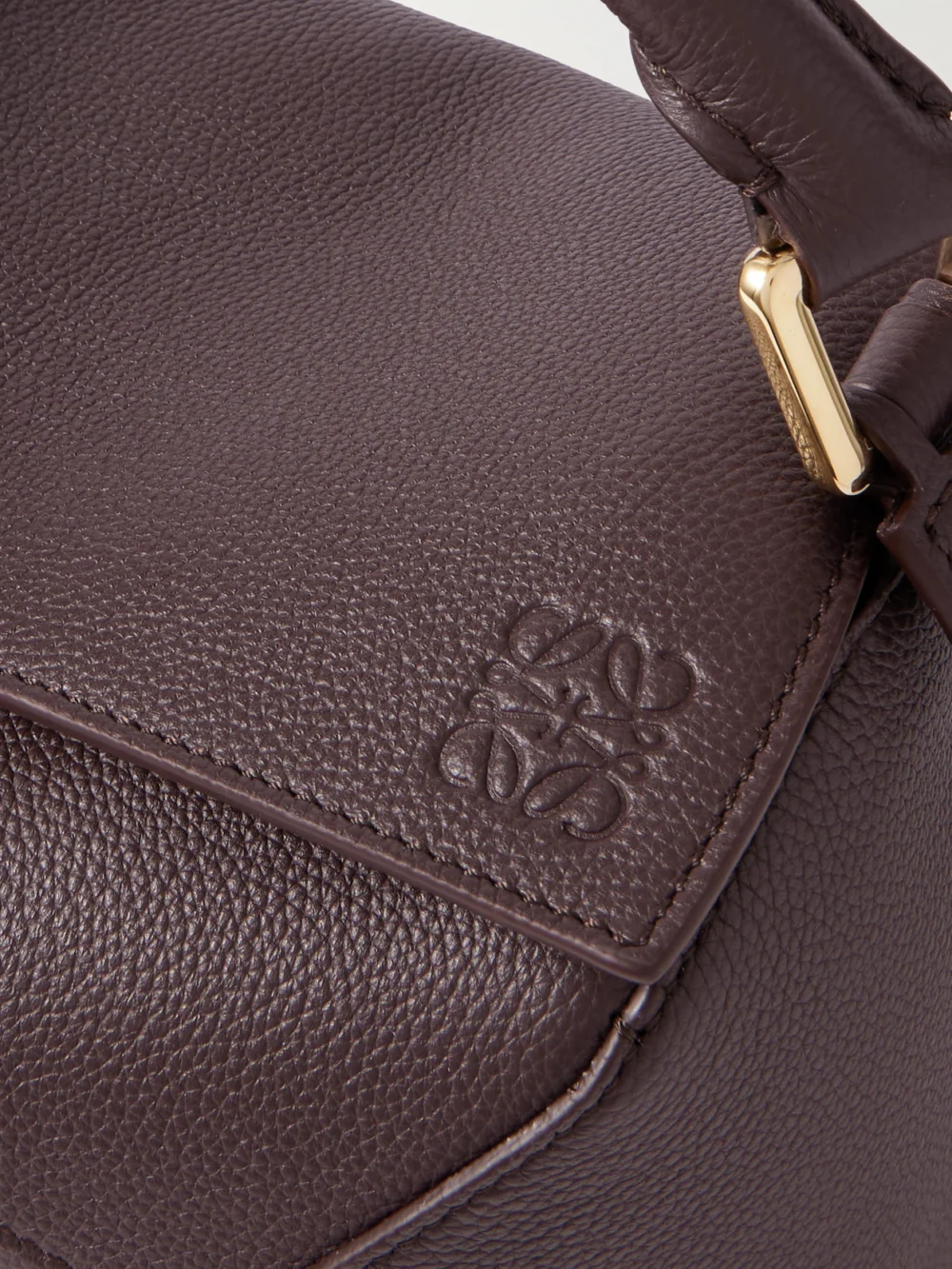 Close-up detail of the Loewe Puzzle Edge Small Textured-leather Shoulder Bag