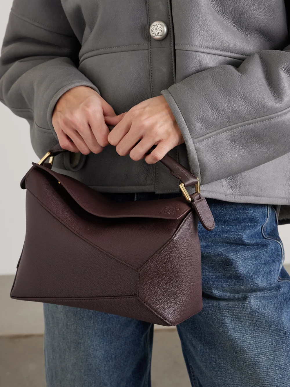 Loewe Puzzle Edge Small Textured-leather Shoulder Bag, styled view