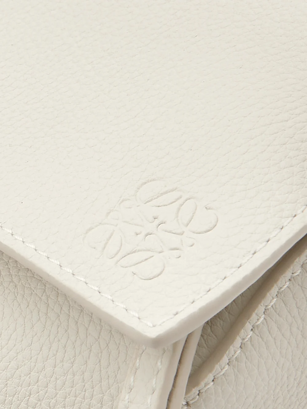 Close-up detail of the Loewe Puzzle Edge Small Textured-leather Shoulder Bag