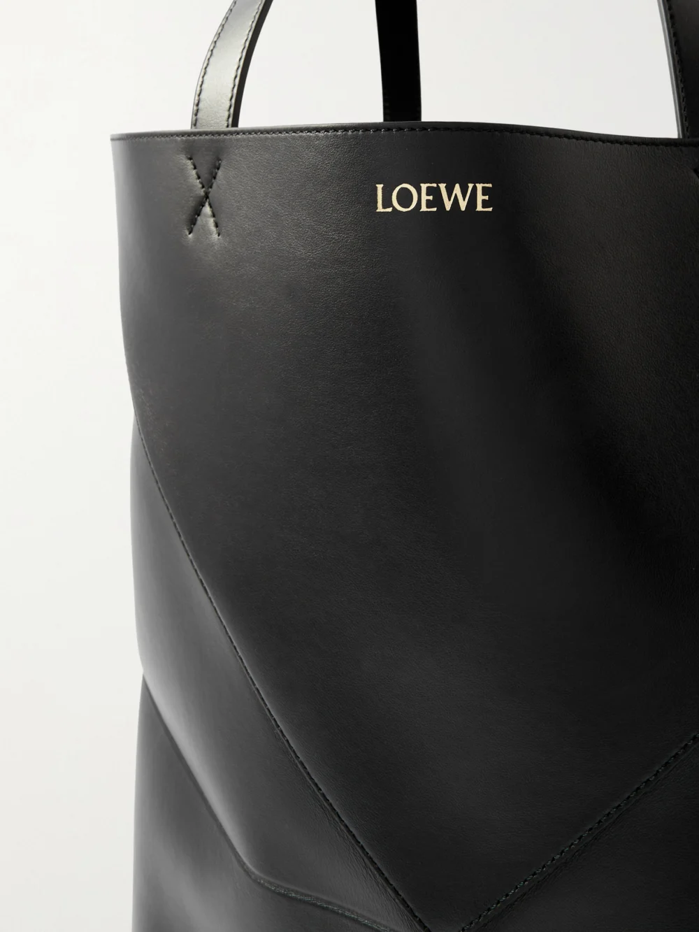 Close-up detail of the Loewe Puzzle Fold Convertible Large Leather Tote