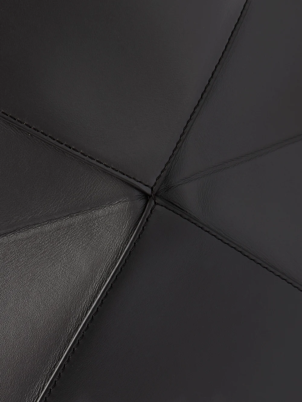 Close-up detail of the Loewe Puzzle Fold Convertible Large Leather Tote