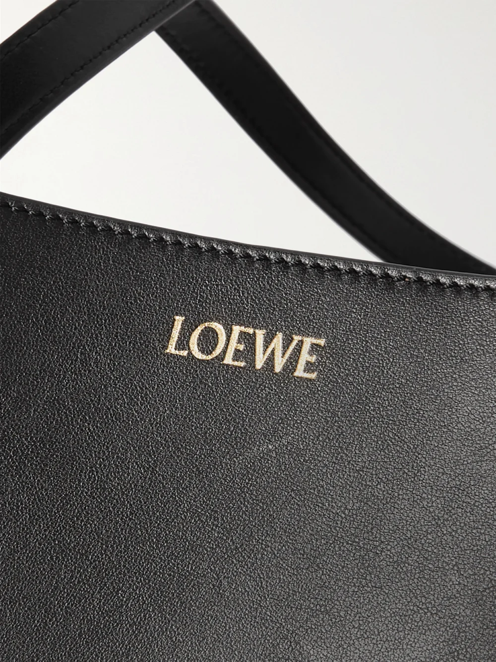 Close-up detail of the Loewe Puzzle Fold Convertible Medium Leather Tote