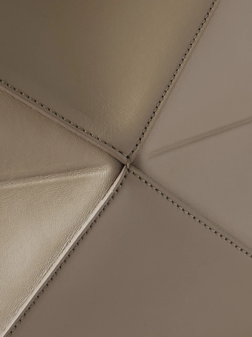 Close-up detail of the Loewe Puzzle Fold Convertible Medium Leather Tote