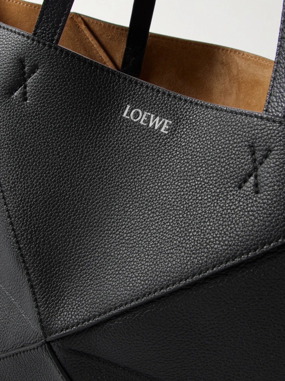 Close-up detail of the Loewe Puzzle Fold Horizontal Large Textured-leather Tote