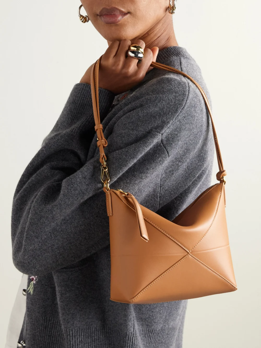 Loewe Puzzle Fold Leather Clutch, styled view