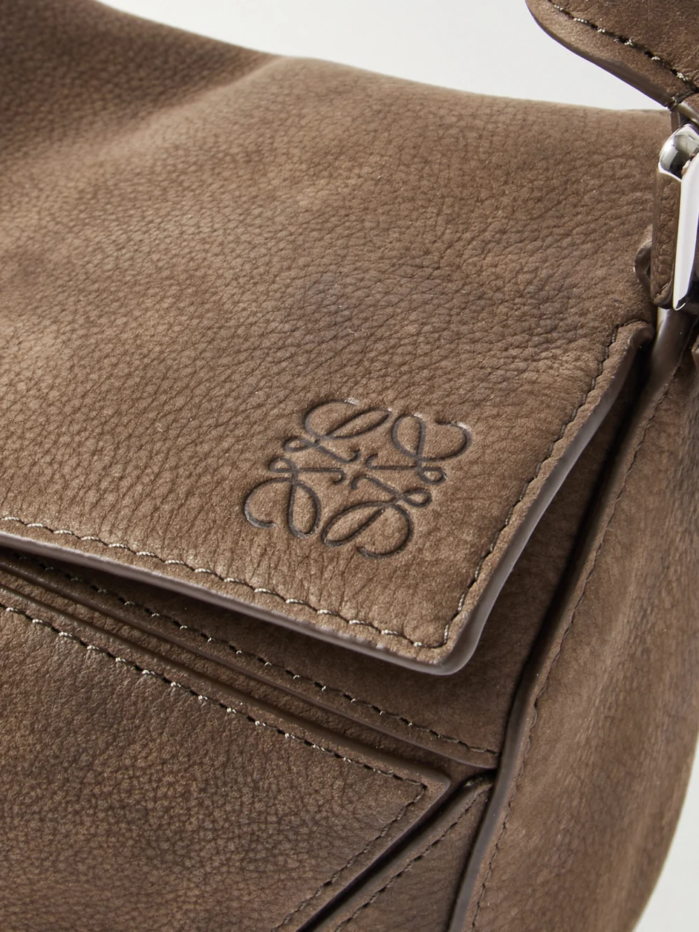 Close-up detail of the Loewe Puzzle Small Textured-nubuck Shoulder Bag
