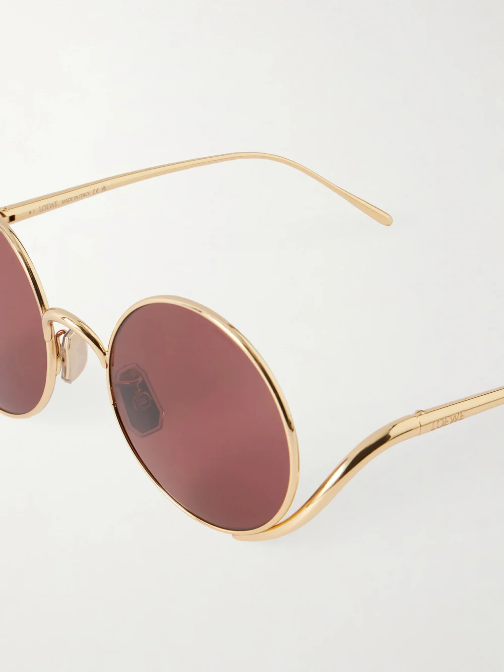 Close-up detail of the Loewe Round-frame Gold-tone Sunglasses