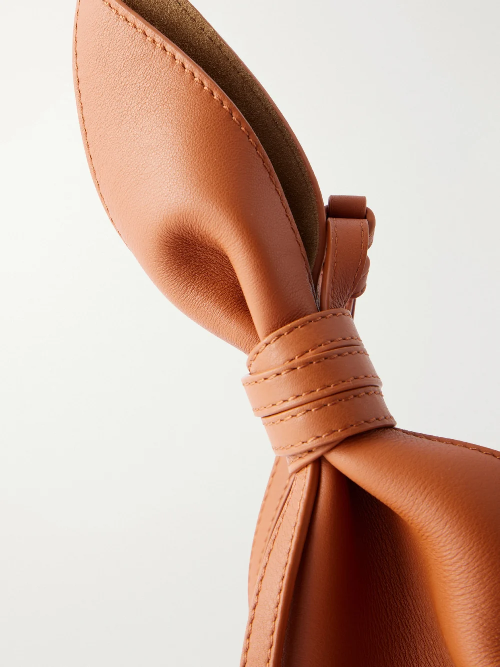 Close-up detail of the Loewe Scarf Medium Knot-detailed Leather Shoulder Bag