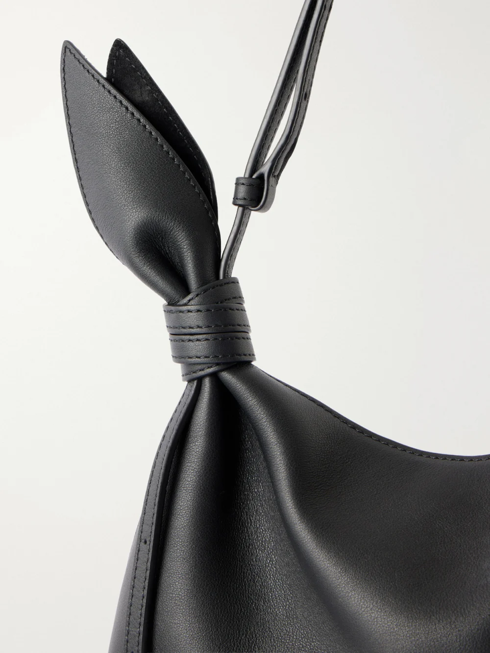 Close-up detail of the Loewe Scarf Mini Knot-detailed Leather Shoulder Bag