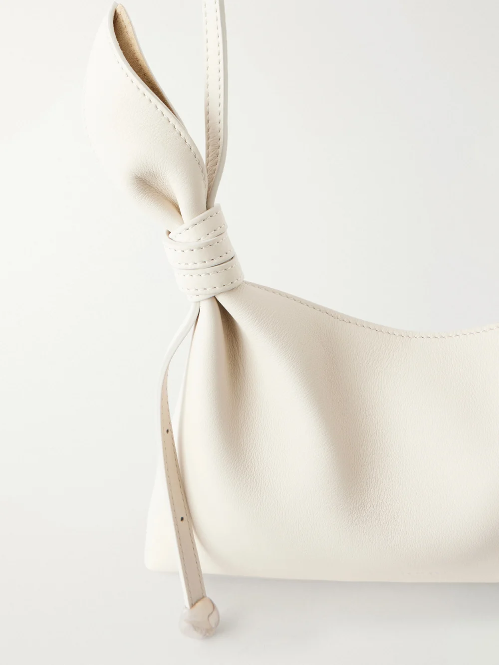 Close-up detail of the Loewe Scarf Mini Knot-detailed Leather Shoulder Bag