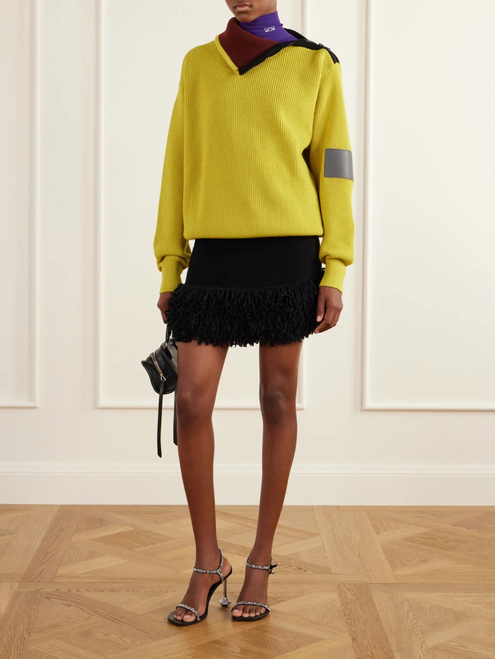 Loewe Zip-detailed Leather-trimmed Ribbed Wool-blend Turtleneck Sweater, worn by a model