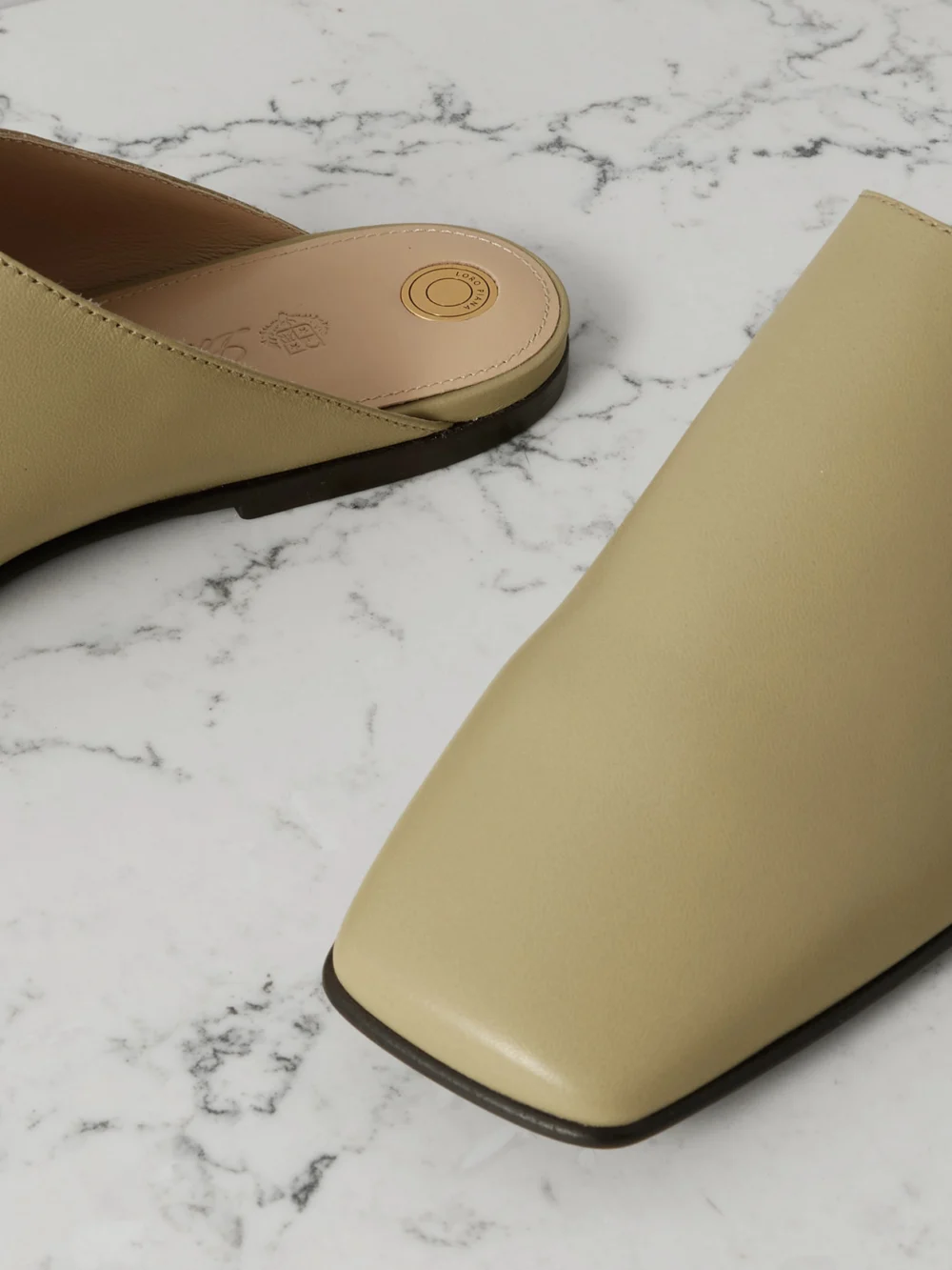 Close-up detail of the Loro Piana Alba Leather Slippers
