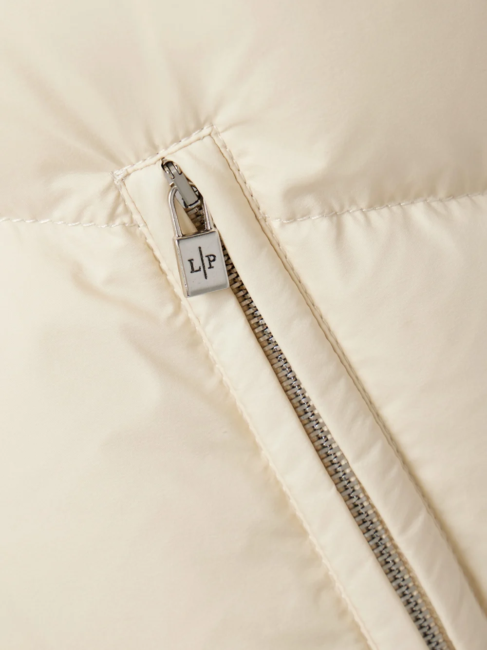 Close-up detail of the Loro Piana Andry Reversible Two-tone Quilted Shell Down Vest