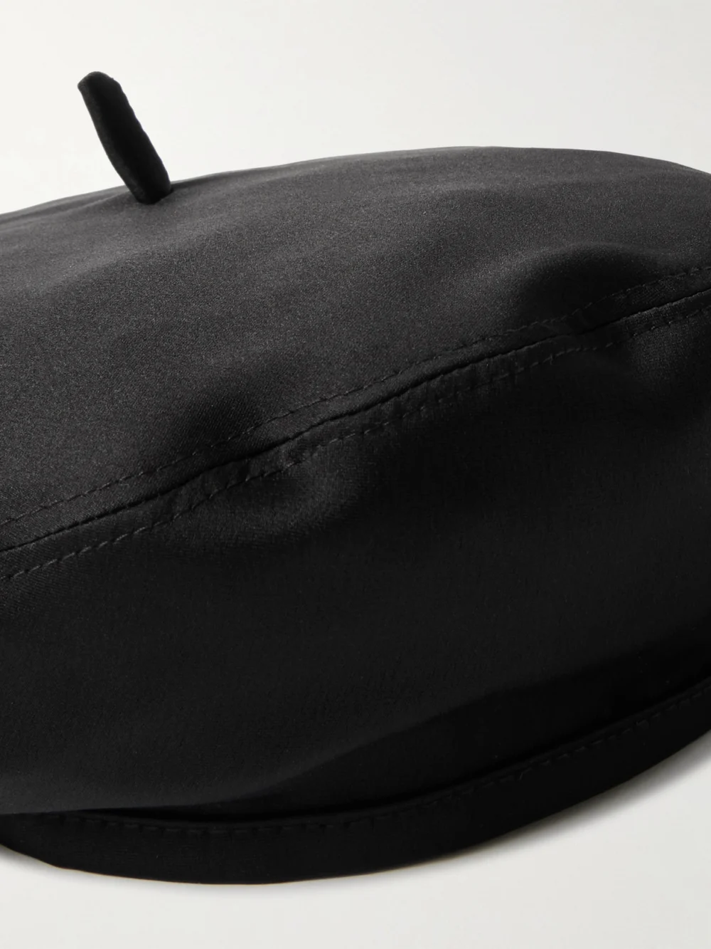 Close-up detail of the Loro Piana Anna Washed-silk Beret