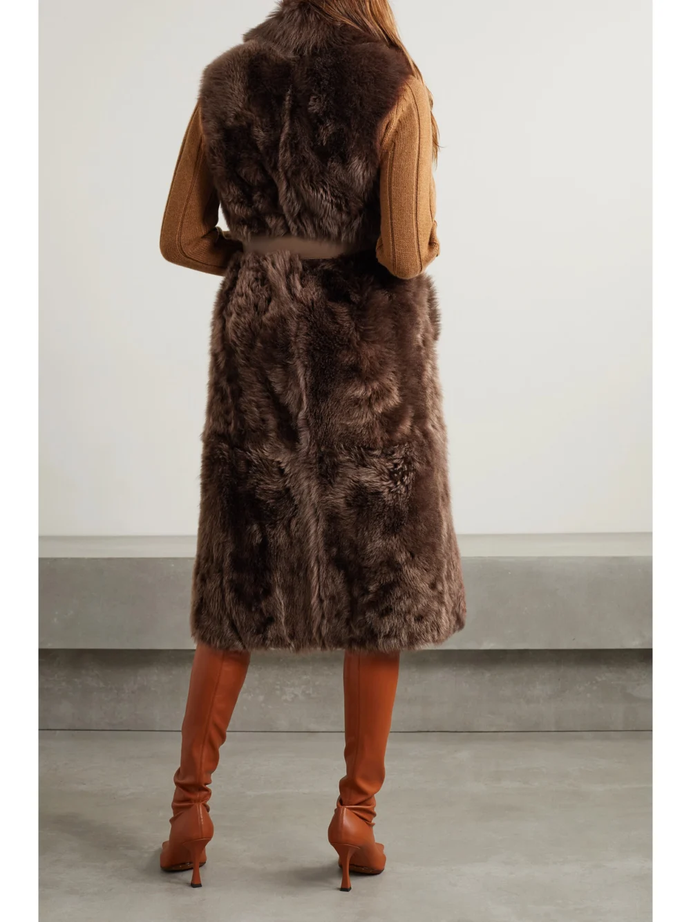 Back view of the Loro Piana Ardis Reversible Belted Shearling and Suede Vest