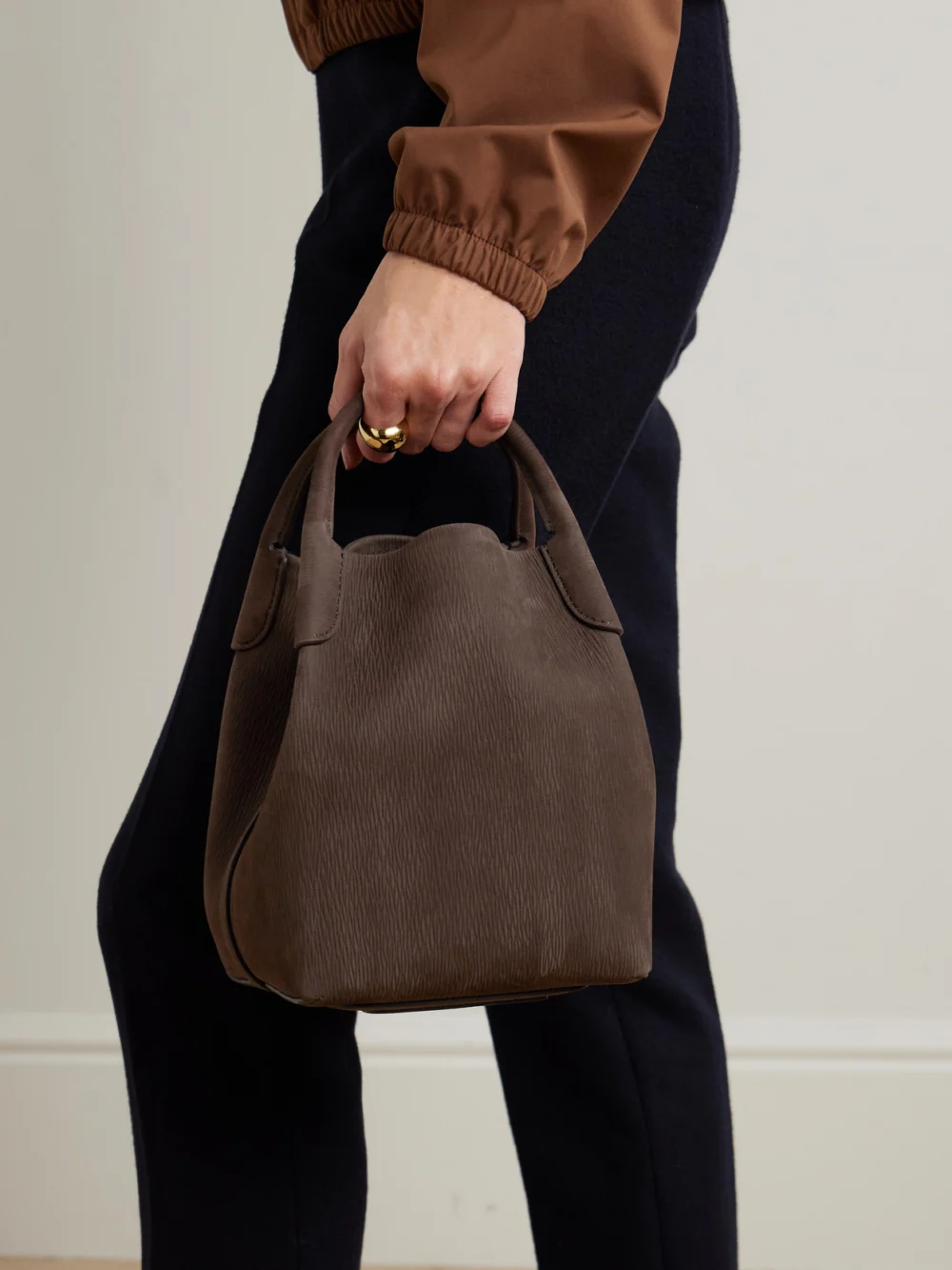 Loro Piana Bale Small Textured-suede Shoulder Bag, styled view