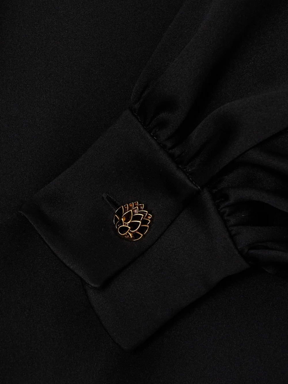 Close-up detail of the Loro Piana Carys Embellished Silk-satin Blouse