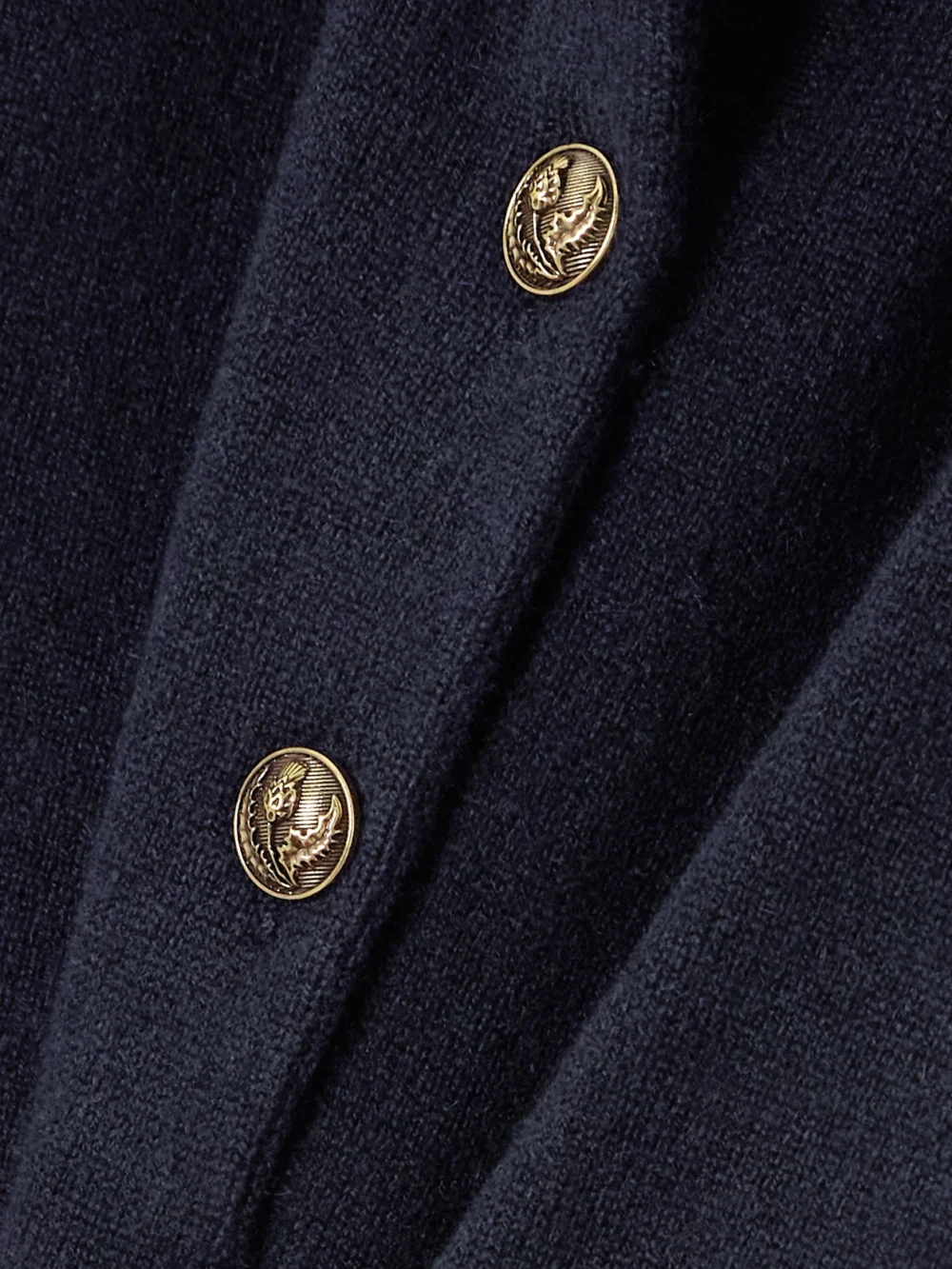 Close-up detail of the Loro Piana Cashmere Polo Sweater