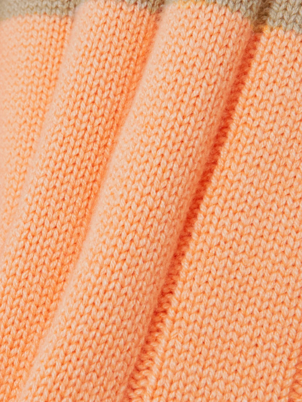 Close-up detail of the Loro Piana Daosta Color-block Ribbed Cashmere Turtleneck Sweater