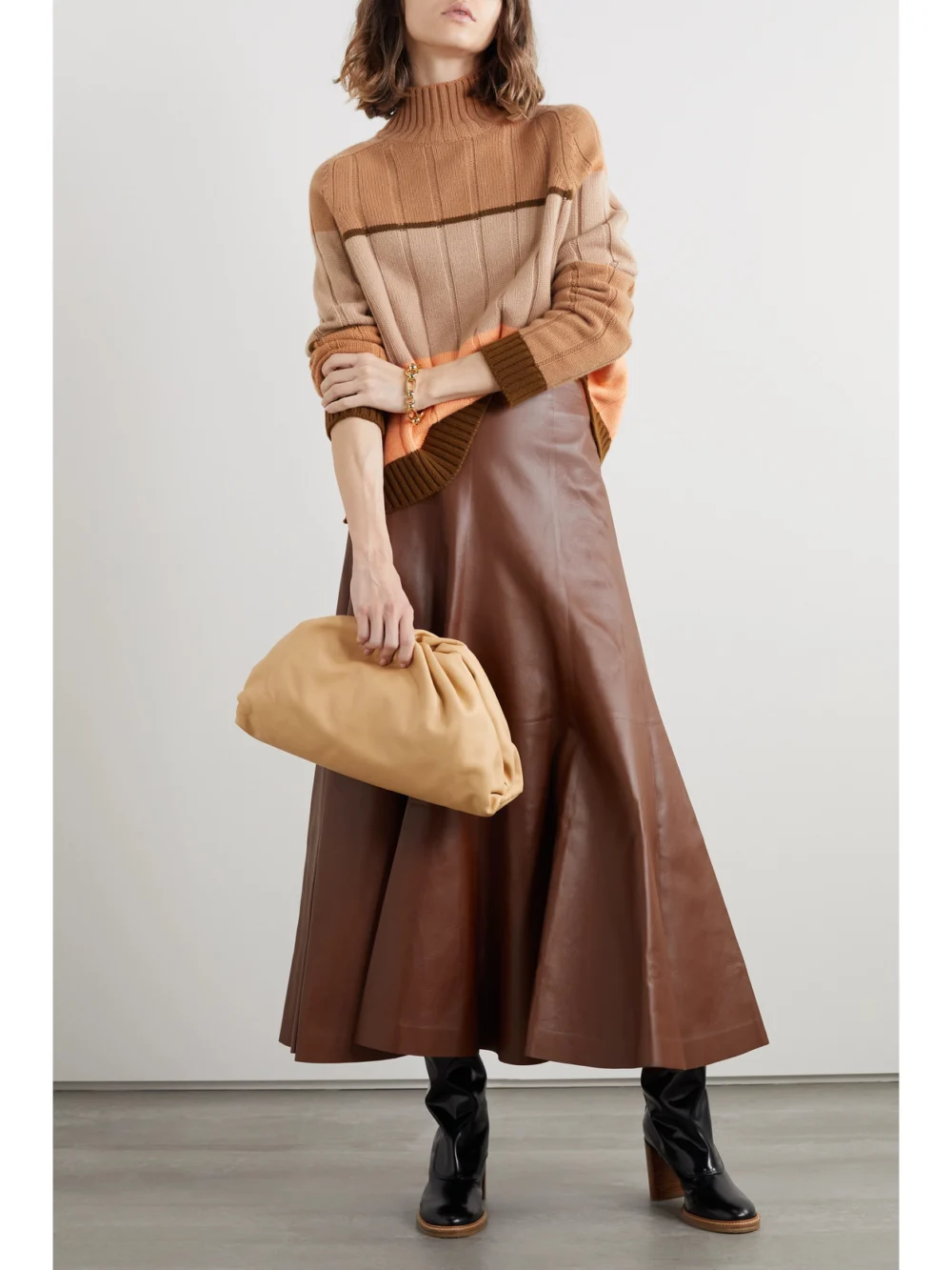 Loro Piana Daosta Color-block Ribbed Cashmere Turtleneck Sweater, worn by a model