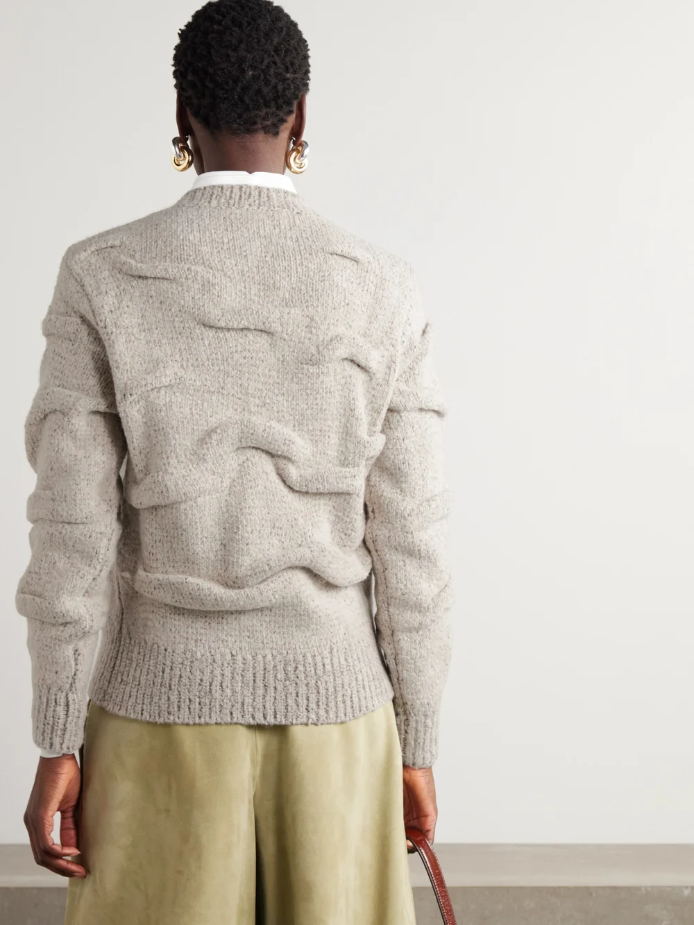 Back view of the Loro Piana Gathered Knitted Wool Sweater
