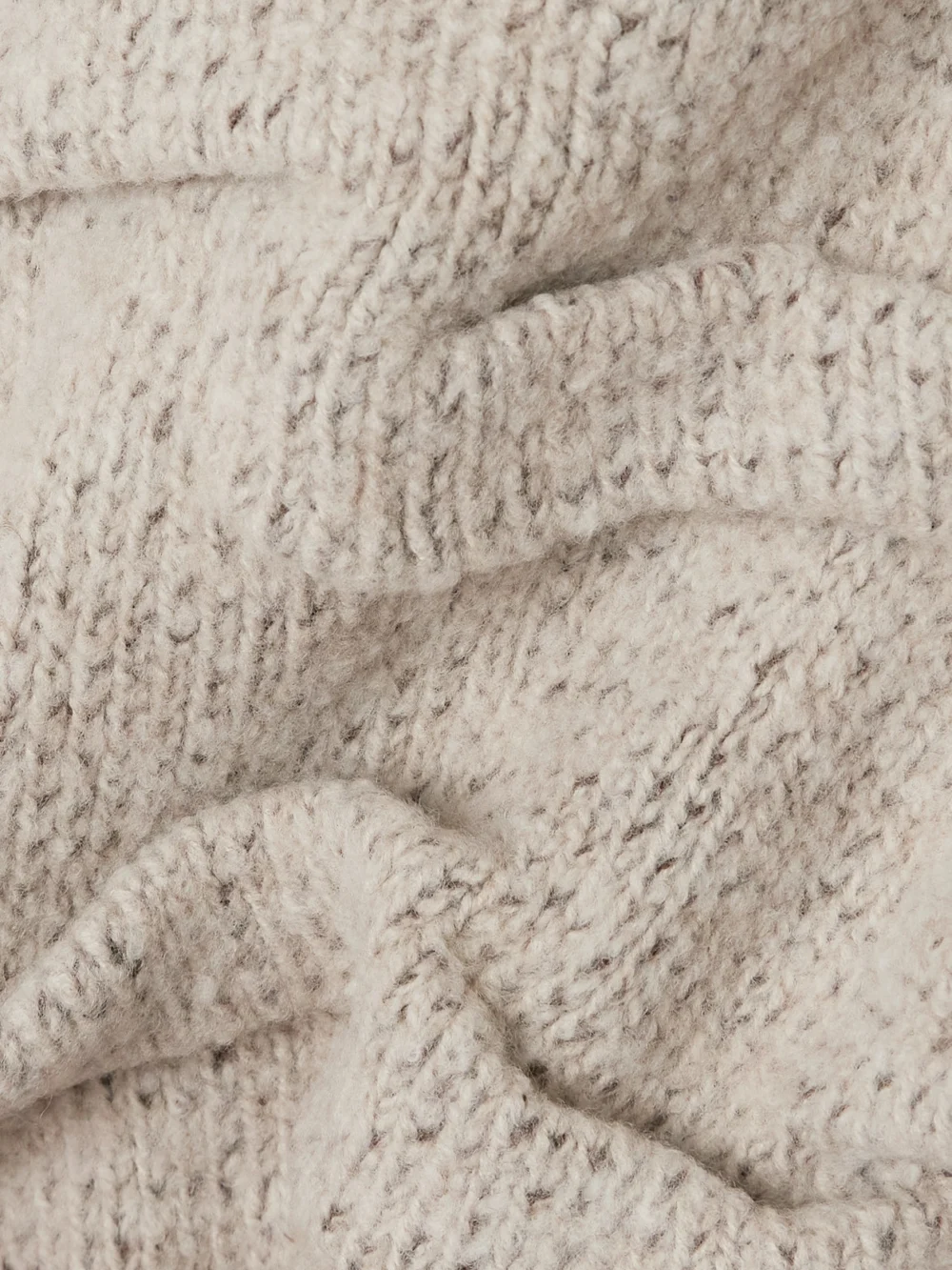 Close-up detail of the Loro Piana Gathered Knitted Wool Sweater