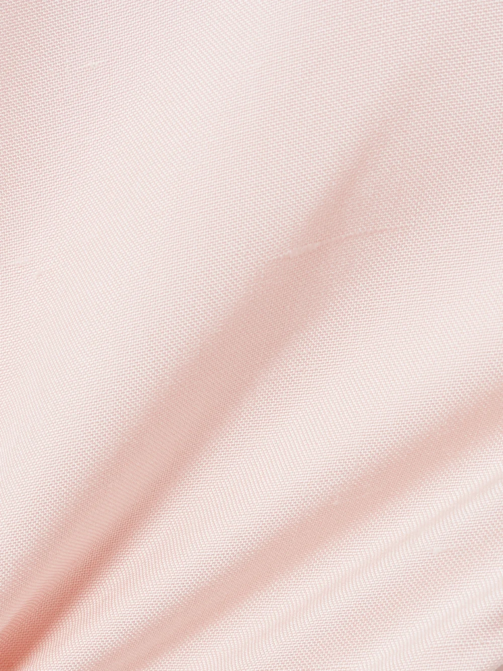 Close-up detail of the Loro Piana Giustina Paneled Silk Midi Skirt