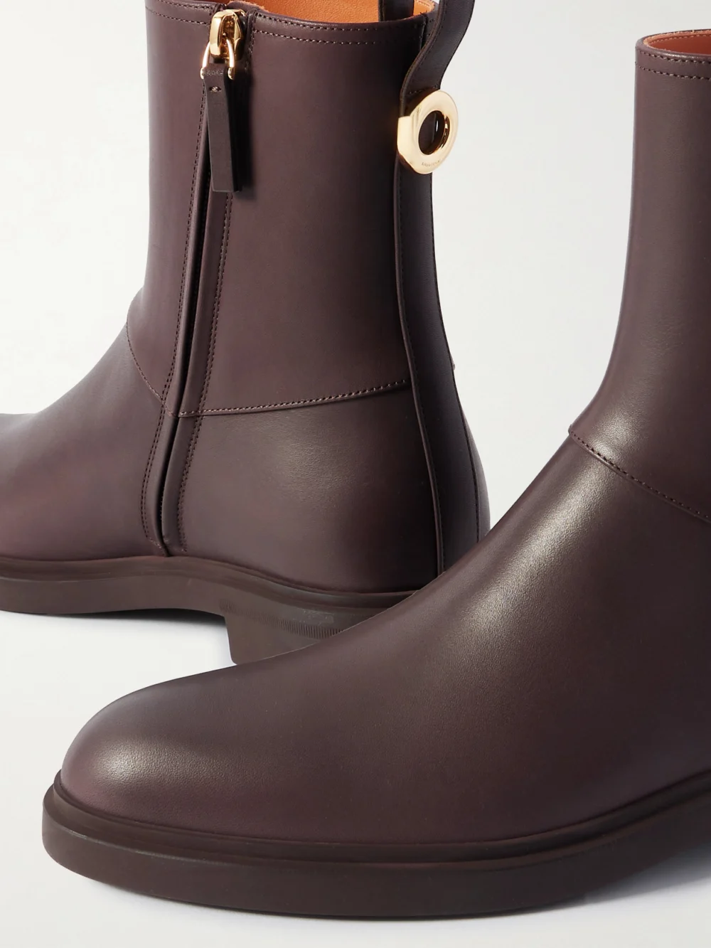 Close-up detail of the Loro Piana Kilda Paneled Leather Ankle Boots