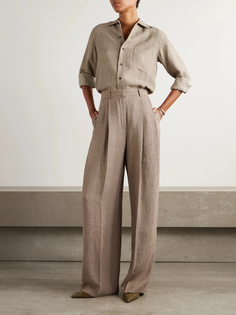 Loro Piana Kurt Pleated Linen Wide-leg Pants, worn by a model