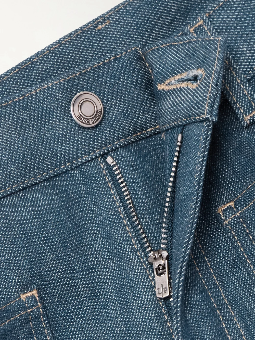 Close-up detail of the Loro Piana Lamark High-rise Flared Jeans