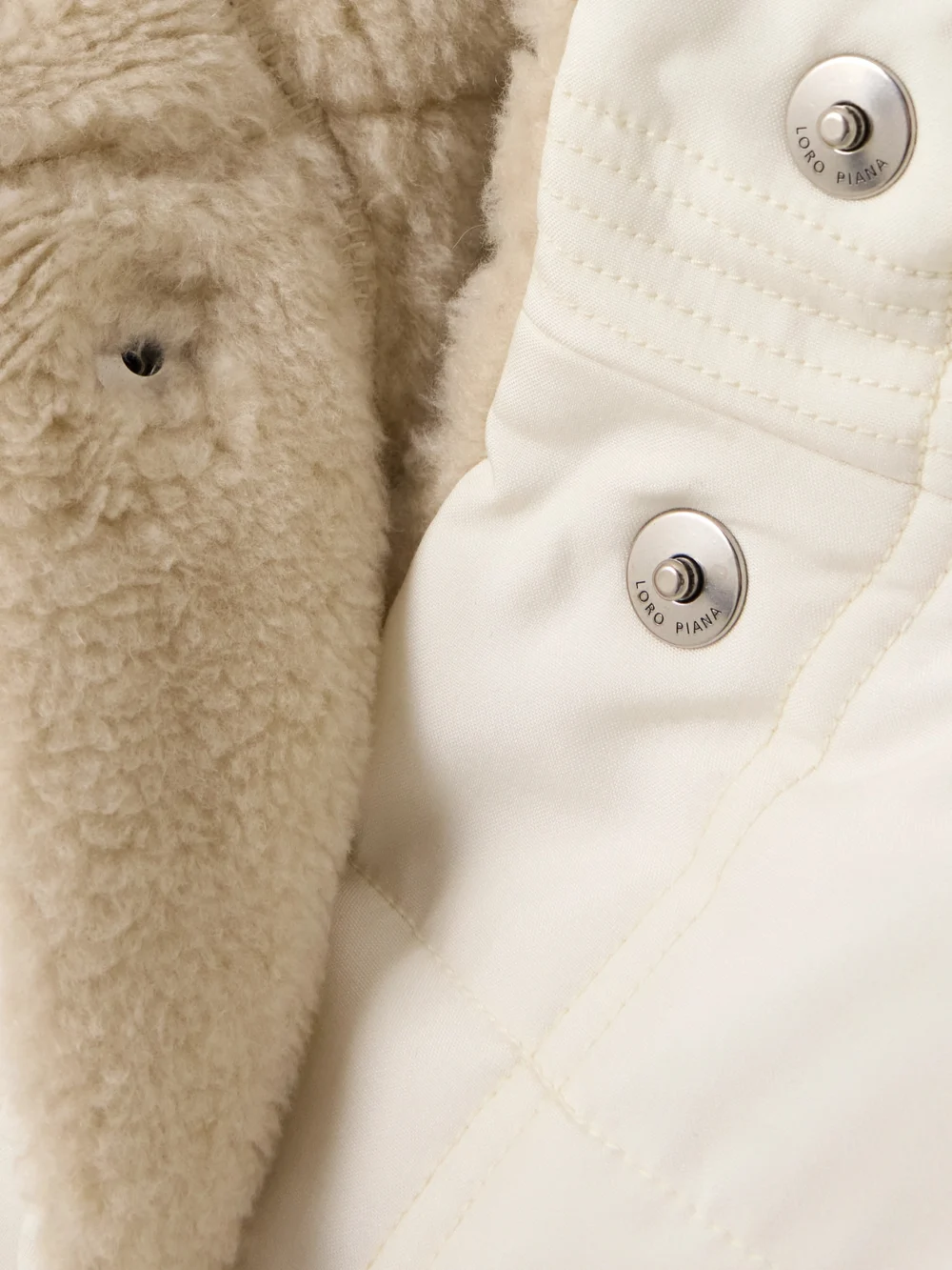 Close-up detail of the Loro Piana Leone Quilted Silk-shell Vest